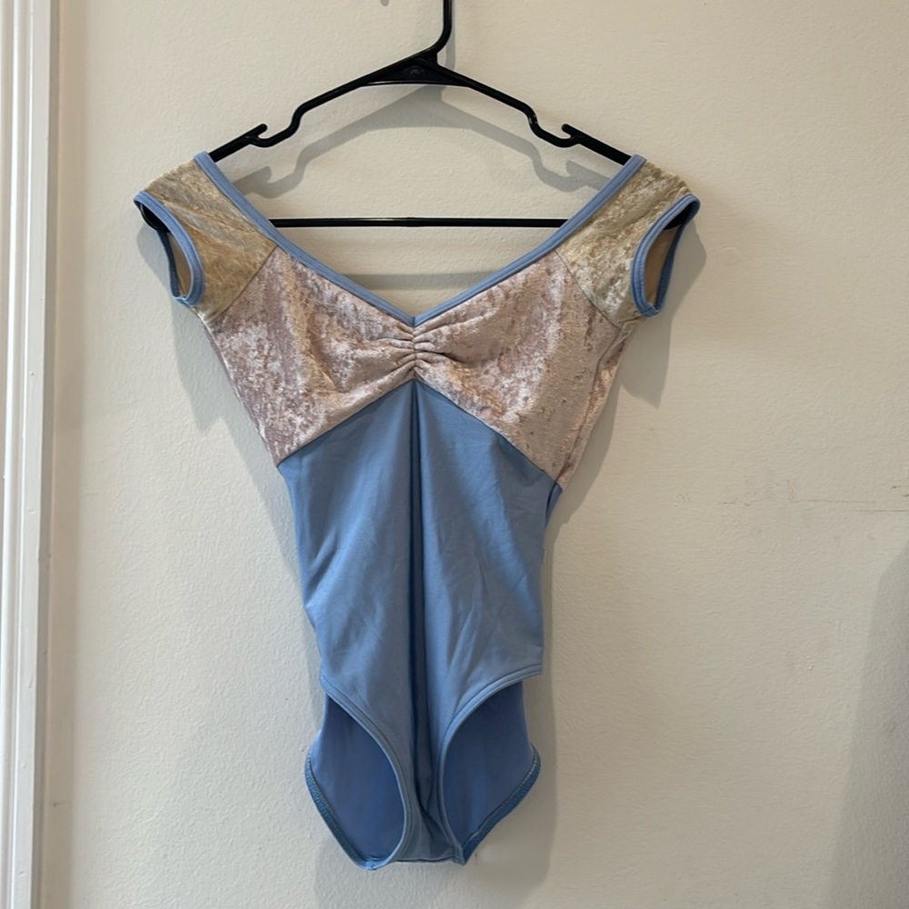 yumiko cap sleave with pinch front and v back pink blue and yellow leotard